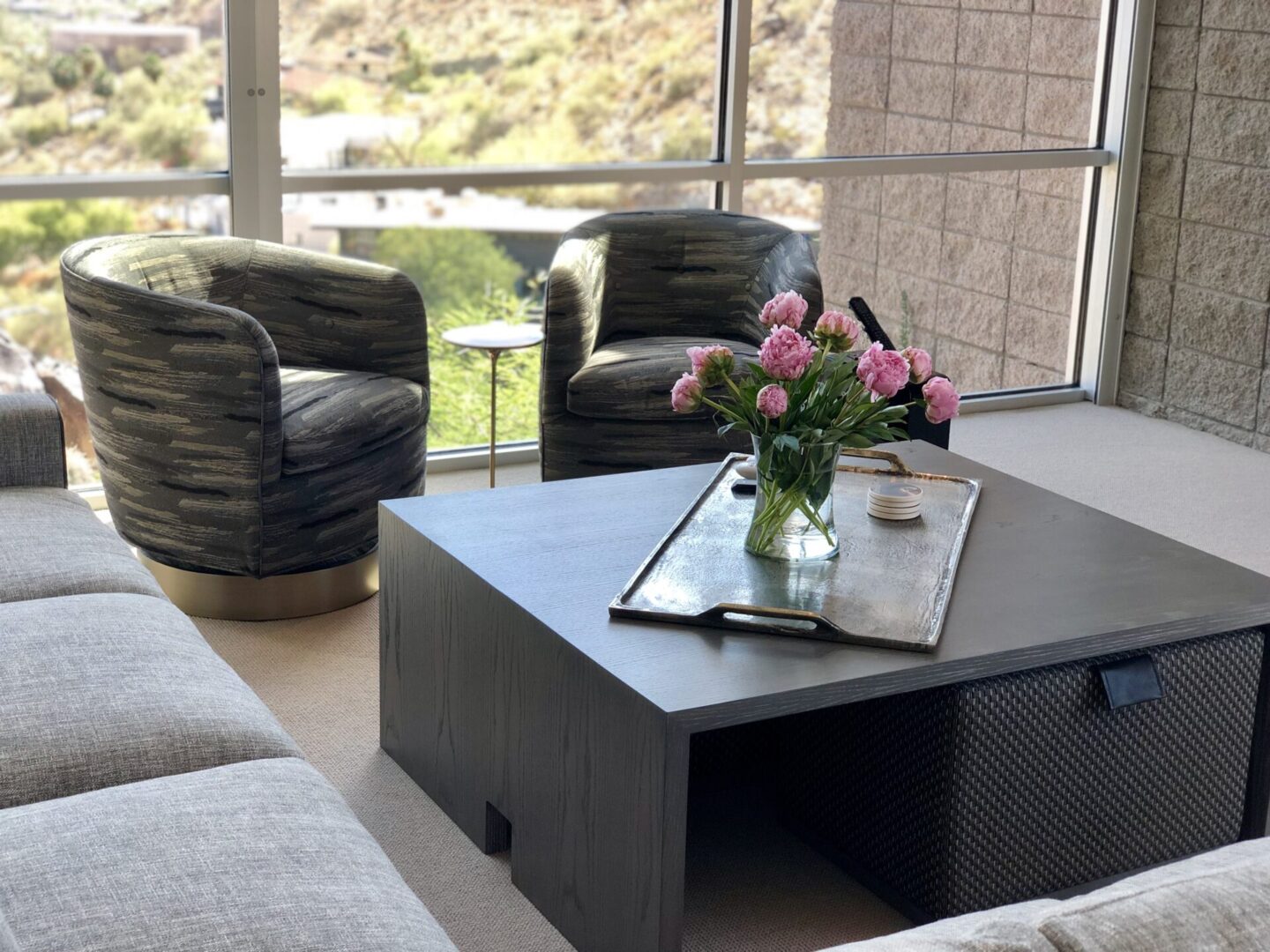 Vase of pink flowers on coffee table