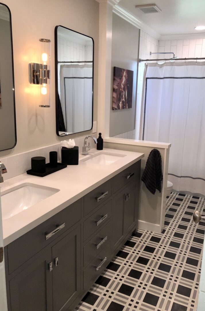 Modern bathroom with double sink and patterned floor